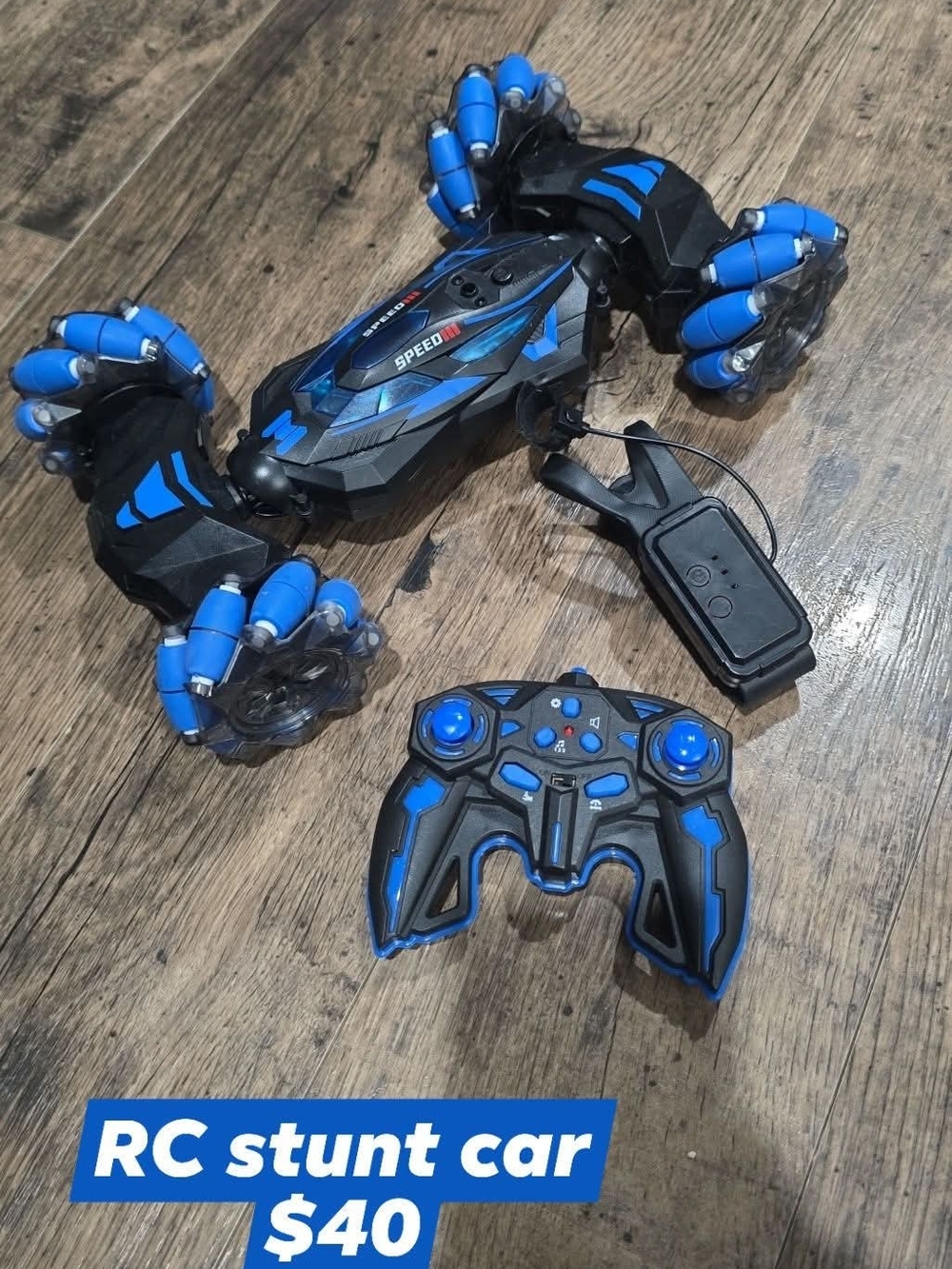 Source Unknown Blue and Black RC Stunt Car